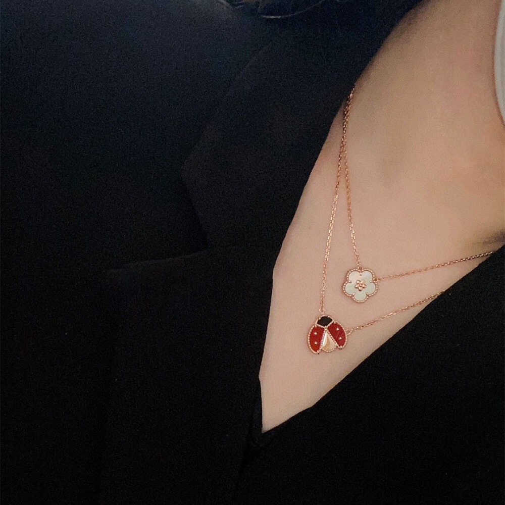 V*n Cl**f & Arpels Lucky Spring pendant, plum blossom